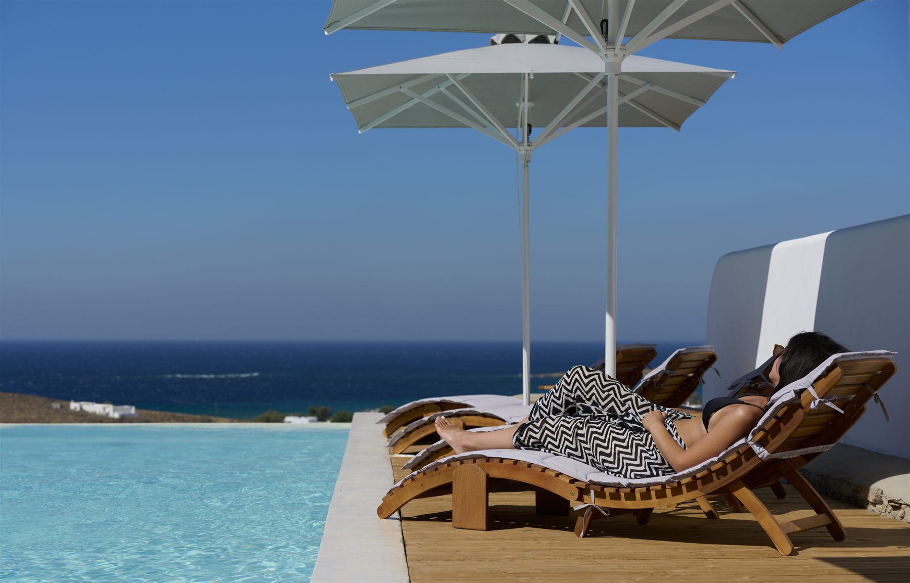 Relaxing on a sunbed by the pool