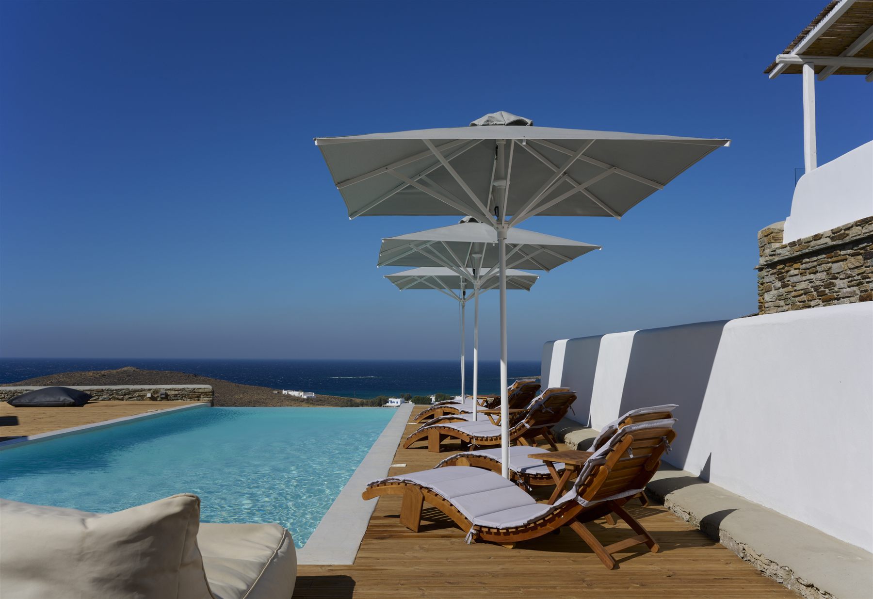 Sun loungers by the pool in the morning